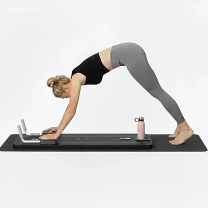 Multifunctional exercise board with various attachments and a woman demonstrating its use.